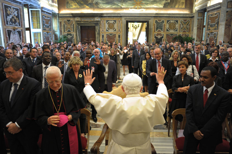 Pope Benedict XVI welcomes U.N. Food and Agriculture Organization delegates at the Vatican Friday, calling for a “human dimension” in economic models.