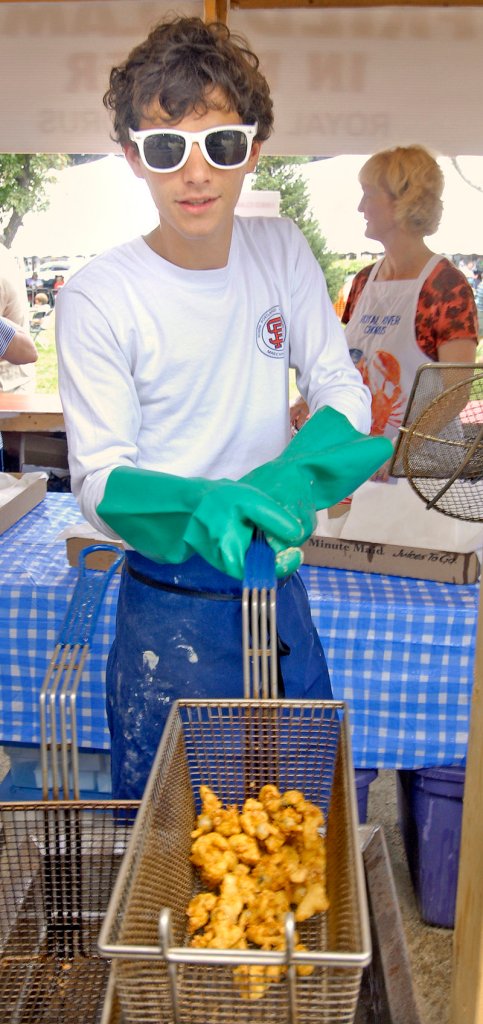 Kegan Zema prepares fried clams at the Royal River Chorus booth during the 2008 festival.
