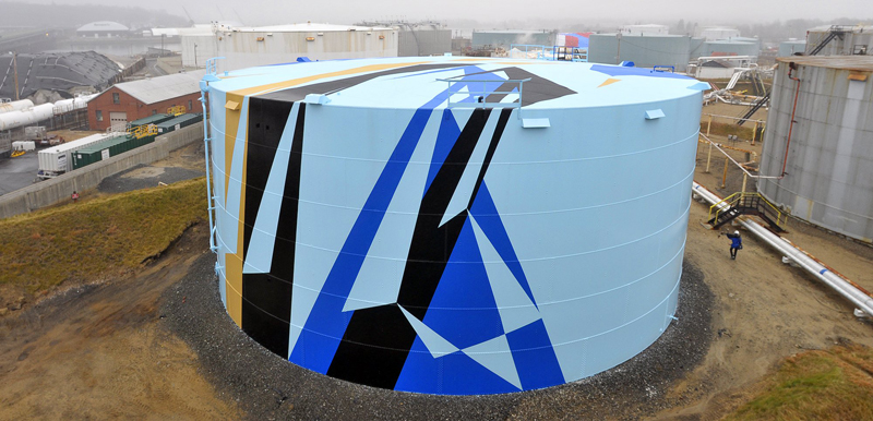 One of the oil tanks at the Sprague Energy farm is painted to the specifications furnished by Jaime Gili of London, the winning artist of the Art All Around competition.