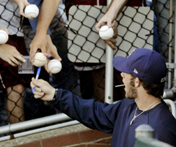 Bryce Harper is the phenom for the Washington Nationals who simply has to poke his head out of a dugout to be deluged with autograph requests. He's 18.