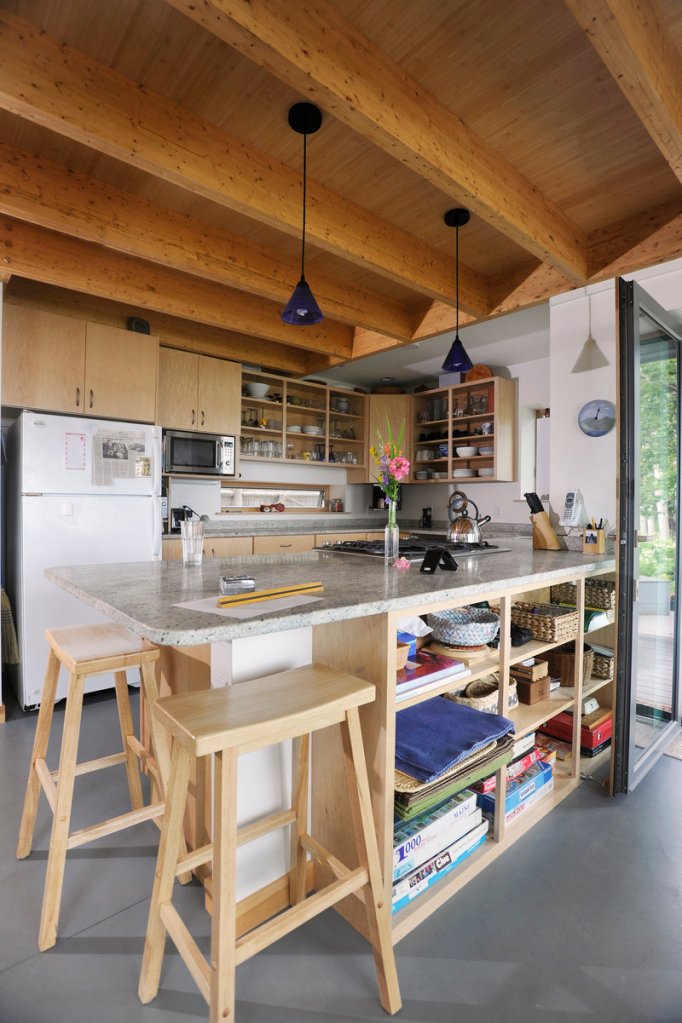 Stools fit under the kitchen island.