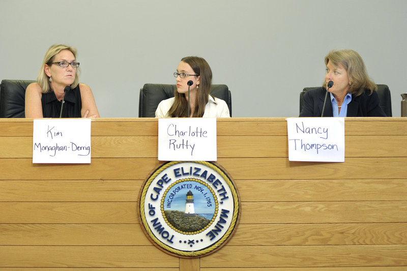 Democrat Kim Monaghan-Derrig, left, and Republican Nancy Thompson, right, appear at a recent candidates forum in Cape Elizabeth. At center is moderator Charlotte Rutty, a senior at Cape Elizabeth High School.