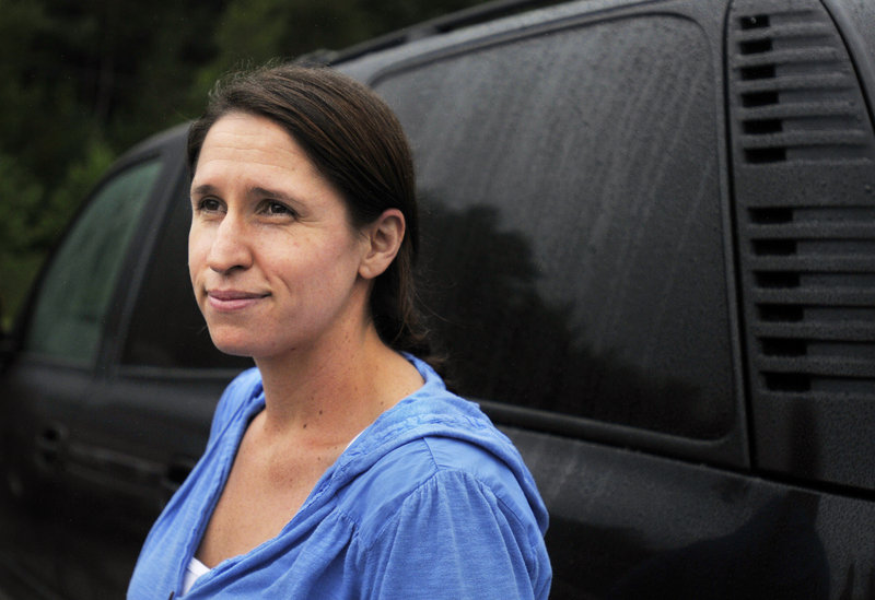 Elizabeth Mazzotti of Topsham says closure of the Brunswick-Topsham commissary will amount to a $4,000 to $5,000 pay cut for her husband, an Army recruiter.