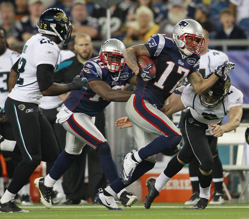 Taylor Price runs after a catch during the Patriots’ 47-12 win over Jacksonville in their first preseason game Thursday. Price had five catches for 105 yards as he showed how much progress he made in the offseason.