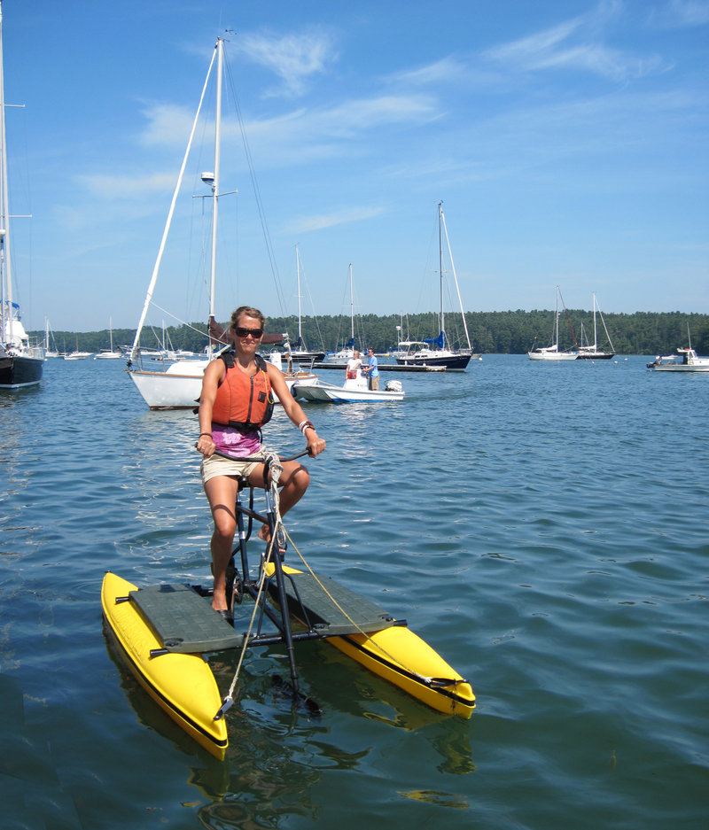 Jill Newel pedals a Hydrobike on the Harraseeket River in South Freeport, where the water-cycling craft are rented out by Ring's Marine Service.