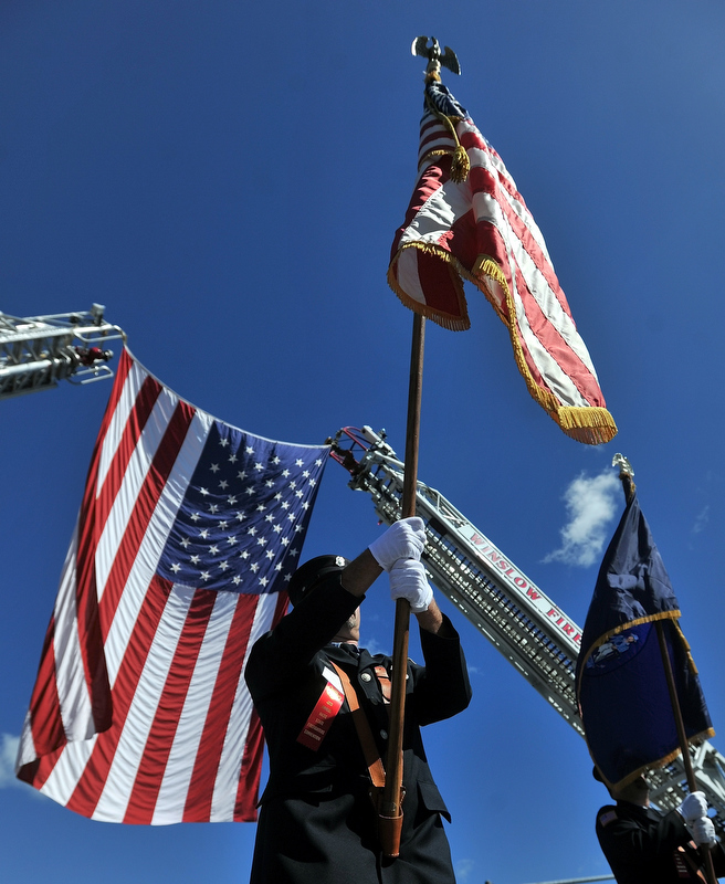 Staff photo by Michael G. Seamans The 48th Maine State Federation of Fire Fighters Convention Parade marches down Main Street in Waterville Saturday morning.