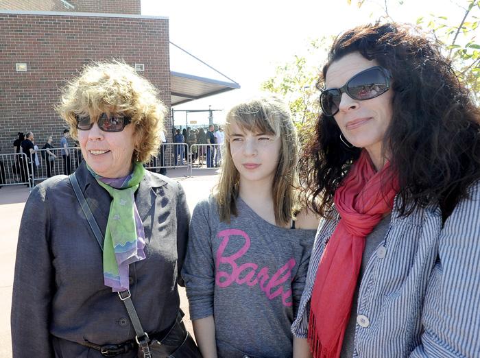 Portlanders Kathleen Stokes, her granddaughter Eidann Thompson Brown, and her daughter Susan Thompson Brown attend first lady Michelle Obama's fundraiser at the Ocean Gateway terminal today.