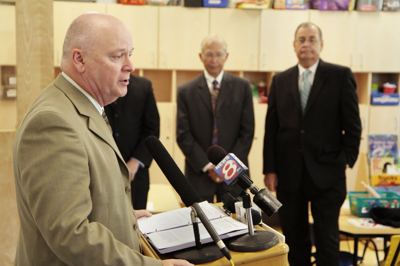 Portland Superintendent of Schools Jim Morse introduces retired military officers Vice Adm. J.D. Williams, center, and Maj. Gen. Tom Kinley at Riverton School on Friday.