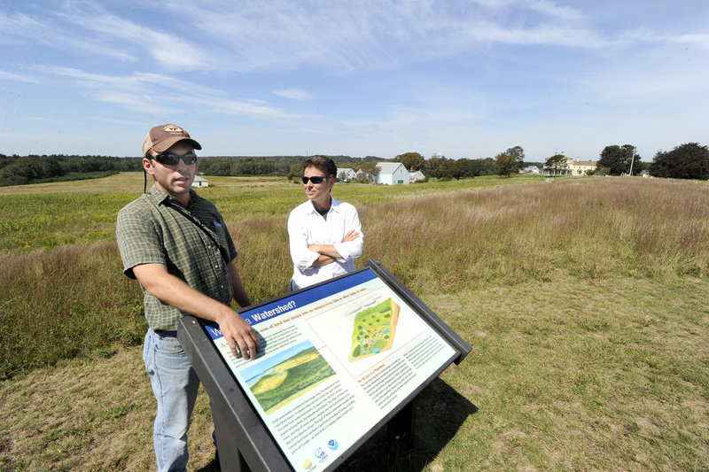 Jeff Feaga, wildlife biologist, and Sue Bickford, natural resources specialist, are trying to manage the land at the Wells National Estuarine Research Reserve to bring back the cottontail rabbit.