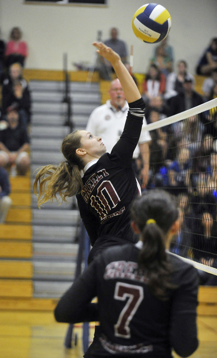 Falmouth teammates Katrina Meserve, left, and Nicole Rogers get up to block a shot by Greely. The Yachtsmen put forth a solid effort despite the absence of middle hitter Jenna Serunian because of a knee injury.