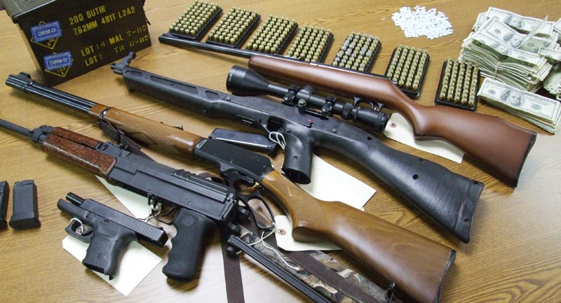 Maine State Police photo of guns seized in raid in Portland on Wednesday night.