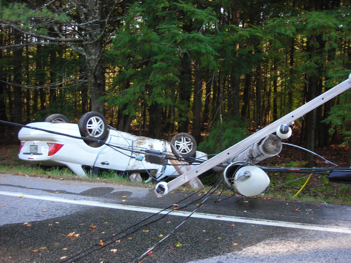 Route 5 in Dayton was shut down and traffic diverted for about five hours on Wednesday while emergency crews rescued Evan Kiesiner, 17, and utility crews worked to restore power.