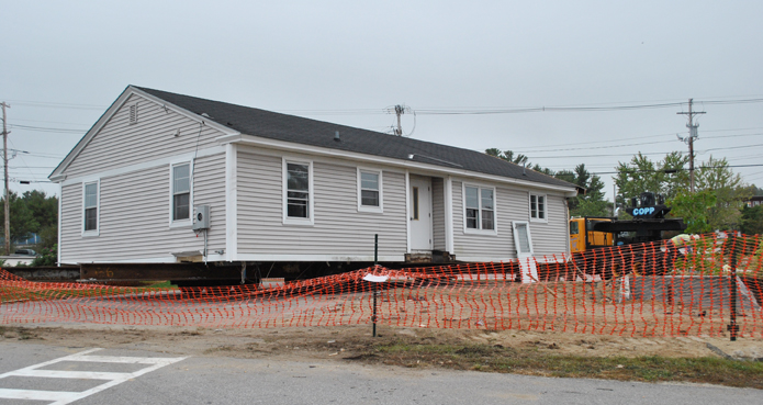 The house on its new site on Newtown Road.