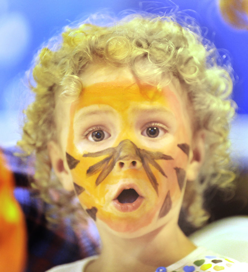 Norah Jane Lushman, 4, of Yarmouth reacts after spotting Portland Pirate mascot Salty Pete at the festival.