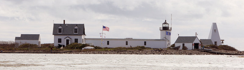 The Goat Island Lighthouse off Cape Porpoise has been restored to its 1950s-era look. A walkway from the main house to the lighthouse, washed away in a storm in 1978, was reconstructed as was a bell tower, at right. The Kennebunkport Conservation Trust owns the island.