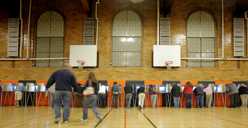 Voters cast their ballots at the Richard J. Martin Community Center in Biddeford today. Several wards in the city reported voter turnout higher than 50 percent.