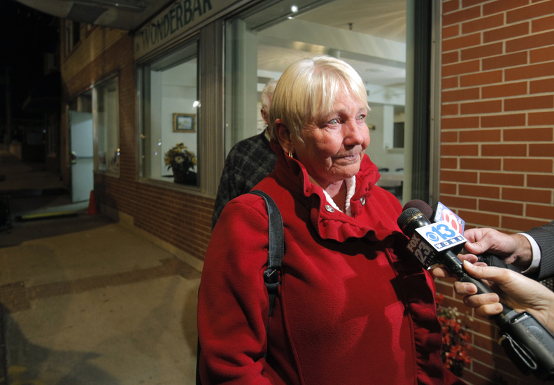 Former Biddeford Mayor Joanne Twomey was escorted out of a forum in Saco on Thursday after confronting Gov. Paul LePage over his budget proposals. 