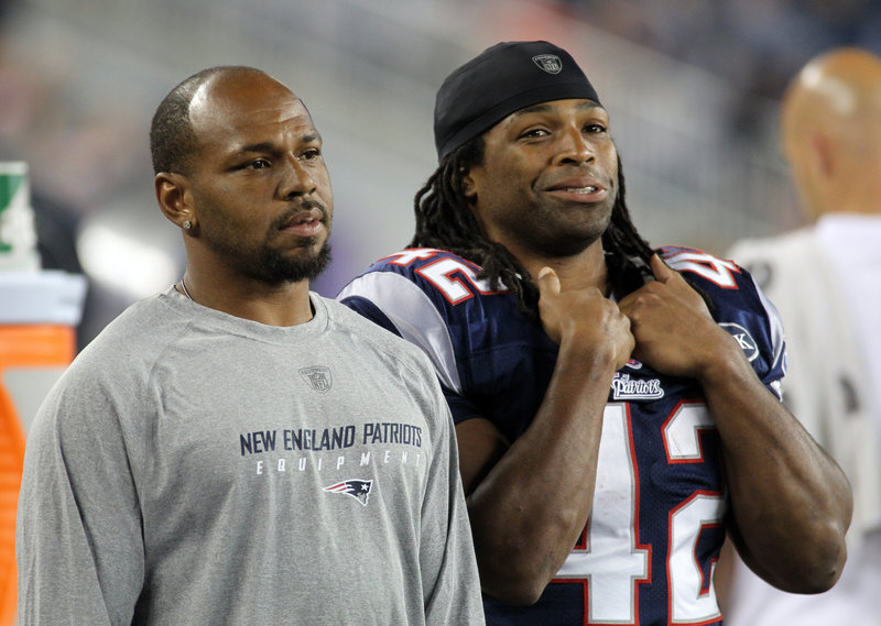 Kevin Faulk, left, with BenJarvus Green-Ellis.