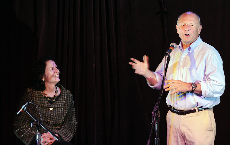 Mayoral candidate Michael Brennan, joined by his wife, Joan, speaks to supporters Tuesday night at Empire Dine & Dance on Congress Street, where he announced his first-round lead in the Portland race. His 5,240 votes were followed by 4,390 for Ethan Strimling and 2,938 for the current mayor, Nicholas Mavodones.