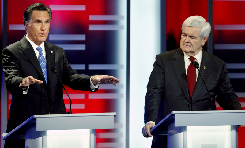 Newt Gingrich, right, told former Massachusetts Gov. Mitt Romney on Saturday, “The only reason you didn’t become a career politician is because you lost to Teddy Kennedy in 1994.” Romney quipped that if he’d achieved his childhood dream, “I would have been a football star all my life, too.”