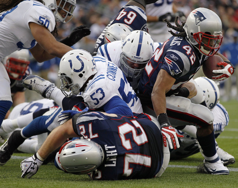 BenJarvus Green-Ellis scores a touchdown with 13 seconds left in the half to give the Patriots a 17-3 lead over the Colts. The Pats widened the lead to 31-3, then hung on for the win.