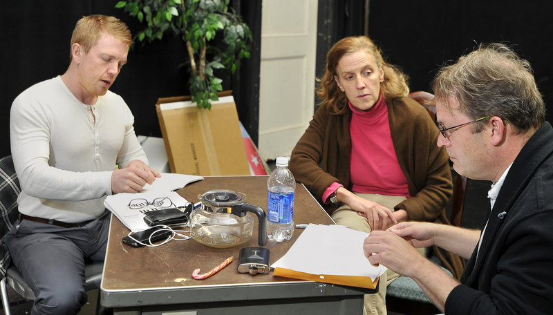 Anita Stewart listens to readings by actors Dustin Tucker, left, and Tom Ford as they consider future Portland Stage Company productions.