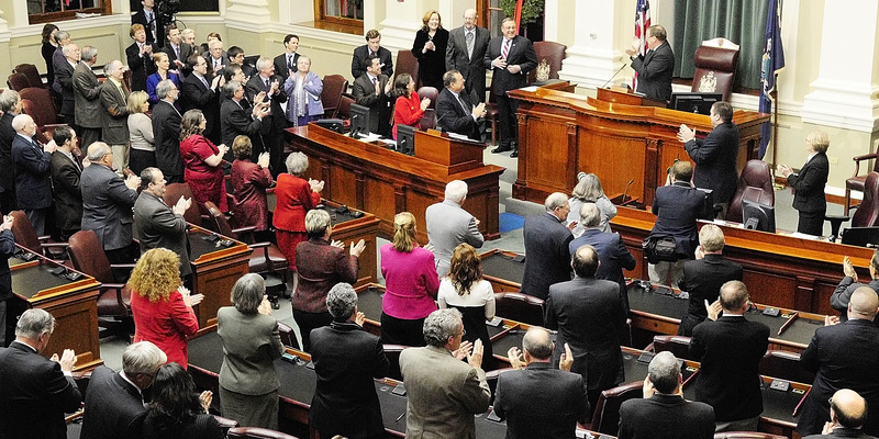 Lawmakers applaud Gov. Paul LePage before he gives his State of the State address on Tuesday evening at the State House in Augusta.