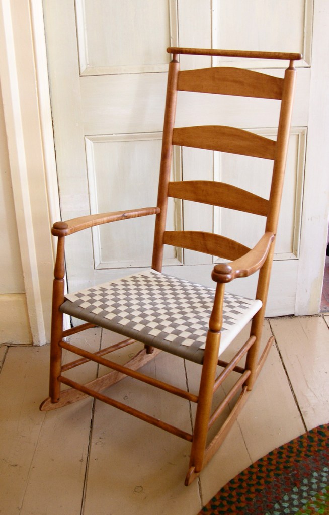 This chair by S. Timberlake has a Shaker shawl bar for hanging a shawl or a throw.