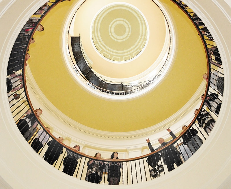 Kevin Rhein directs the Messalonskee High School Chamber Singers on Wednesday morning at the State House in Augusta. The 30 singers from the Oakland school sang the national anthem on the first day of the 125th Legislature’s 2012 session.