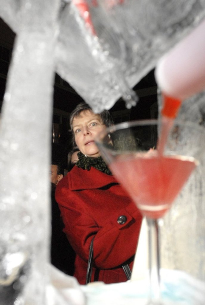 Susan Brennan watches her martini being prepared at the 2010 ice bar.