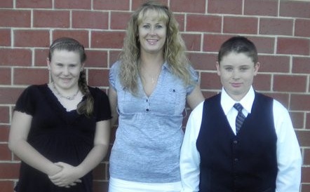 Amy Lake with her children, Cody and Monica. Steven Lake killed all three members of his family in Dexter in June, then killed himself.