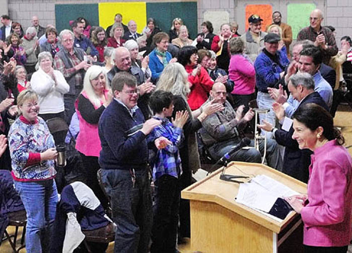 Sen. Olympia Snowe receives applause at a Republican caucus last Saturday in Augusta. Many Maine communities will hold GOP caucuses this Saturday.
