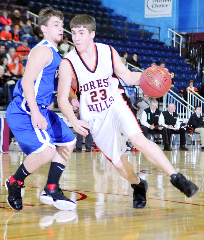 Valley forward Josh West, left, defends against Forest Hills forward Evan Worster during the Class D West tournament on Wednesday morning at the Augusta Civic Center.