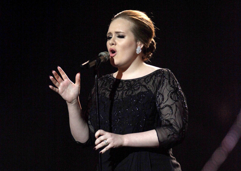 Adele's "21" has topped the charts for 18 weeks. She is scheduled to perform during tonight's ceremonies.