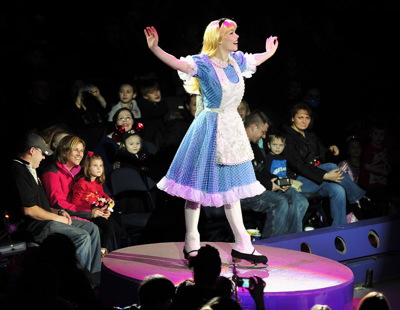 Thrilling children and adults alike, Alice performs in the “Wonderland Whirl” segment of the Disney on Ice performance Thursday night at the Cumberland County Civic Center in Portland. The shows will continue through Sunday.