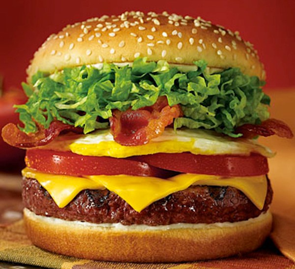 The chain's signature "Royal Red Robin Burger" is topped with a fried egg.