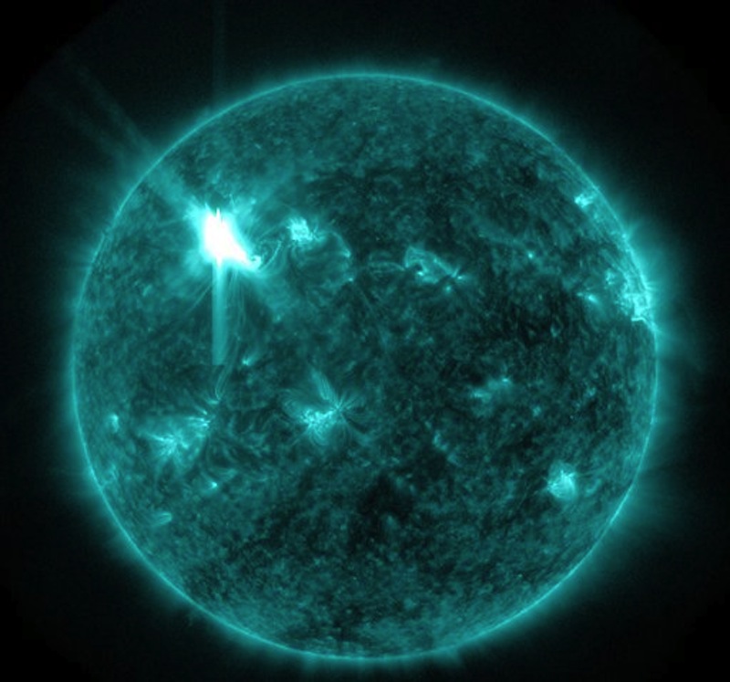 This extreme ultraviolet wavelength image provided by NASA shows a solar flare. An impressive solar flare is heading toward Earth and could disrupt power grids, GPS and airplane flights. Forecasters at the National Oceanic and Atmospheric Administration's (NOAA) Space Weather Prediction Center said the sun erupted Tuesday evening and the effects started smacking Earth late Wednesday night. But so far, the effects have been minimal. (AP Photo/NASA)