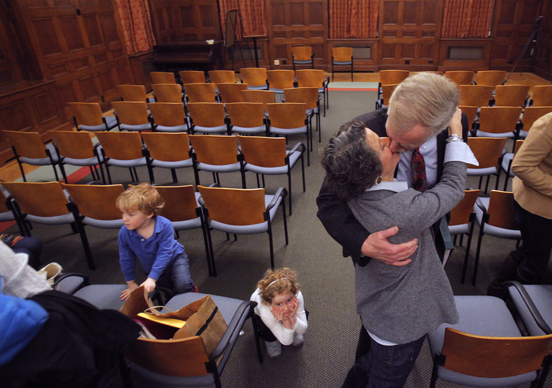 Angus King kisses his wife, Mary Herman, at Bowdoin College on Monday night after announcing his candidacy for the U.S. Senate seat being vacated by Olympia Snowe.