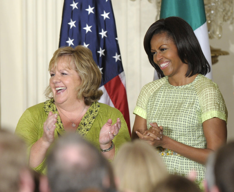 Michelle Obama, right, is known for her kitchen garden at the White House and her healthy eating initiatives. With his love of french fries, hamburgers and banana cream pie, President Obama, below, "kind of undermines the first lady's healthy agenda," says Eddie Gehman Kohan, founding editor of a blog that chronicles the food policies and preferences of the first family and the Obama administration.