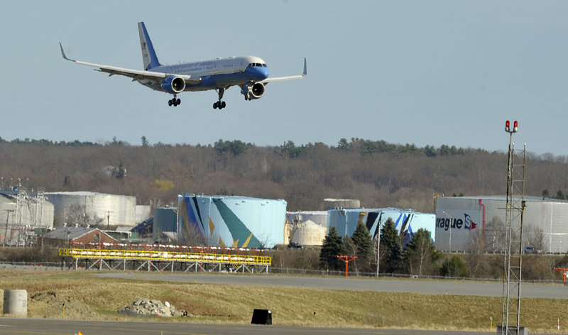 President Obama arrives on Air Force One at the Portland International Jetport on Friday afternoon.