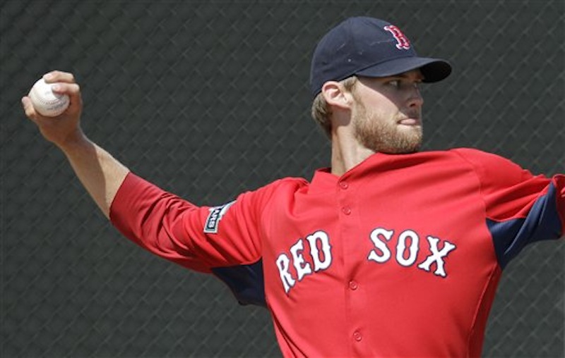Boston Red Sox pitcher Daniel Bard throws on the side during a practice at the team's spring training baseball camp in Fort Myers, Fla., Sunday, April 1, 2012. Manager Bobby Valentine announced that Bard would be in the starting rotation when they start the season. (AP Photo/Charles Krupa)