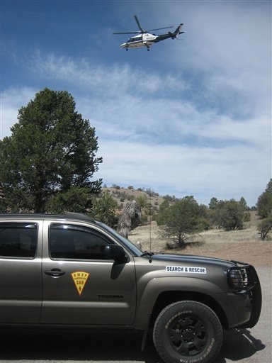 In this March 29, 2012 photo, search and rescue teams, including dog teams, horse teams, a National Guard helicopter and a Civil Air Patrol fixed-wing aircraft scour the wilderness surrounding the Gila Cliff Dwellings in search for missing runner Micah True, in Silver City, N.M. Search teams intensified efforts Saturday, March 31, to find True, who mysteriously vanished four days ago after heading out from a lodge for a morning run in the rugged wilderness near New Mexico's Gila National Forest. (AP Photo/New Mexico Search and Rescue via Silver City Daily Press & Independent)