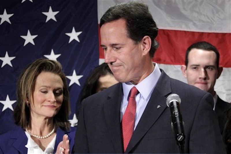 Former Pennsylvania Sen. Rick Santorum turns to his wife Karen, left, after announcing he is suspending his candidacy for the presidency, Tuesday, April 10, 2012, in Gettysburg, Pa. (AP Photo/Gene J. Puskar)