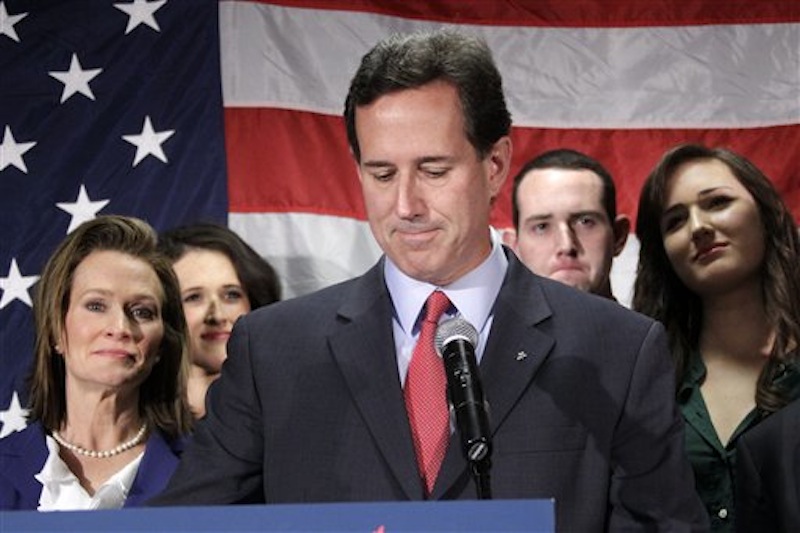 Surrounded by members of his family Republican presidential candidate and former Pennsylvania Sen. Rick Santorum announced today, April 10, 2012, he is suspending his candidacy. (AP Photo/Gene J. Puskar)