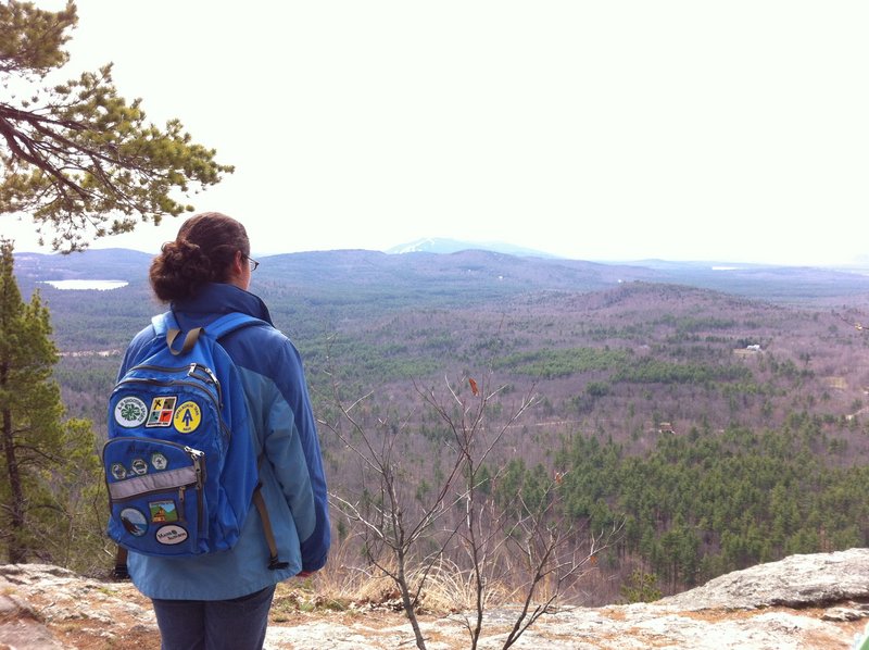 A young hiker enjoys the reward of getting to the top of Sabattus Mountain in Lovell. From the trailhead it’s a 1.5-mile loop, with an elevation gain of about 500 feet.