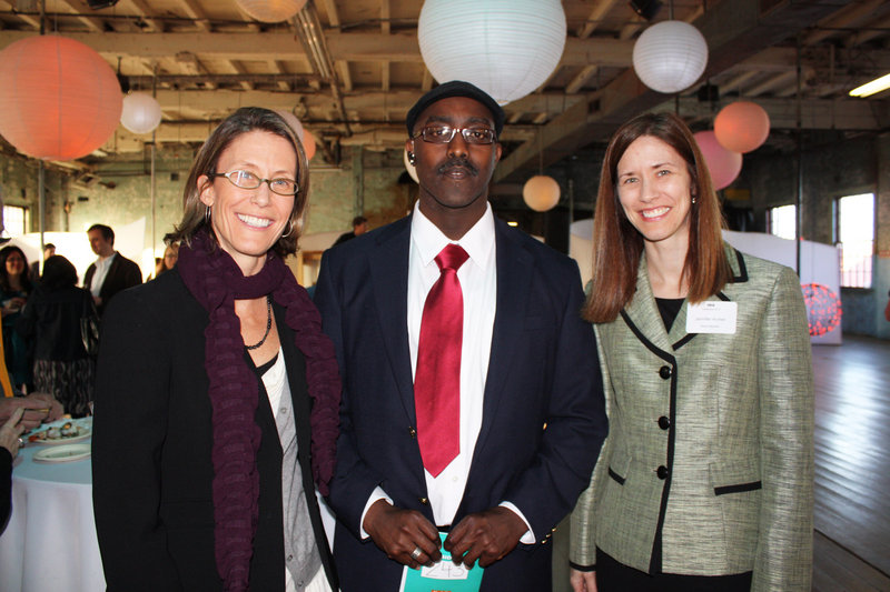 Immigrant Legal Advocacy Project board President Lori Dwyer, translator Alain Jean Claude Nahimana and board member Jennifer Archer.