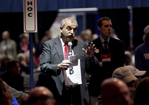 State party chairman Charlie Webster addresses the Republican convention to urge leaders to try to wrap up business on time Sunday at the Augusta Civic Center.