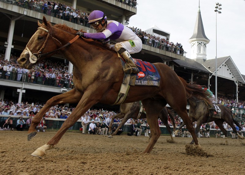 Jockey Mario Gutierrez rides I'll Have Another to victory in the 138th Kentucky Derby at Churchill Downs in Louisville, Ky., on Saturday.