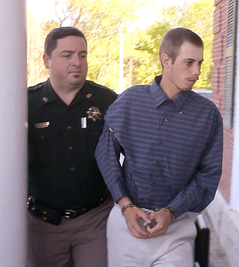 Gordon Collins-Faunce is led into York County Superior Court in Alfred on May 11. Collins-Faunce was charged with depraved indifference murder and is being held on $100,000 bail.