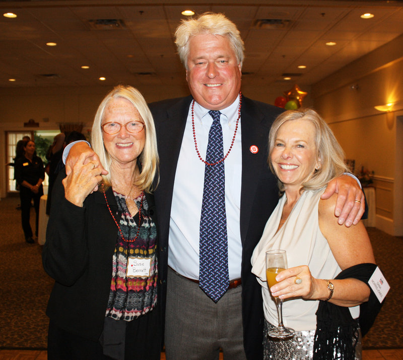 Susie Bennett, Bill Bennett, president of Oakhurst Dairy, and board member Dana Morris-Jones of Delphi Group Inc.